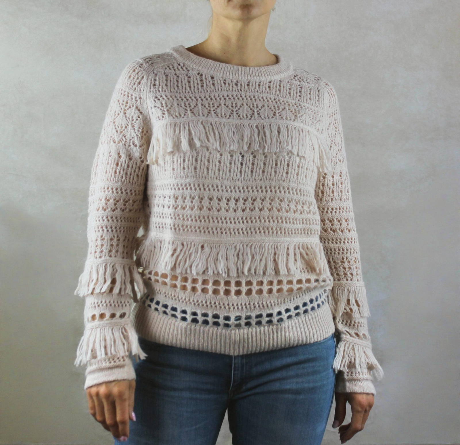 Jersey calado con detalle de flecos