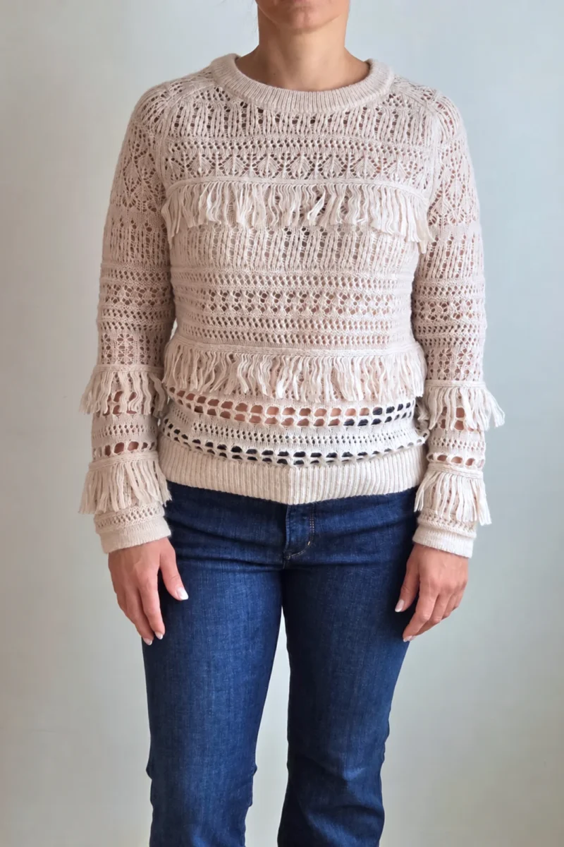 Jersey calado con detalle de flecos